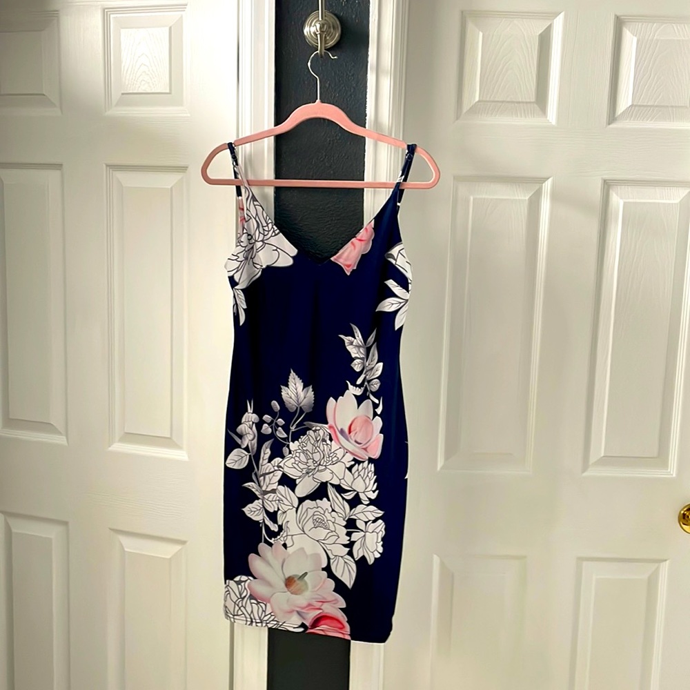Beautiful navy blue floral dress. Never worn.